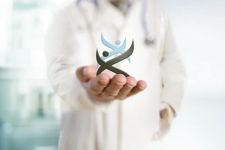 Doctor holding a healthcare symbol, representing personalized and integrated medical care
