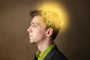 Man with glowing gears symbolizing mental performance
