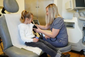 Preventous clinician examining a child