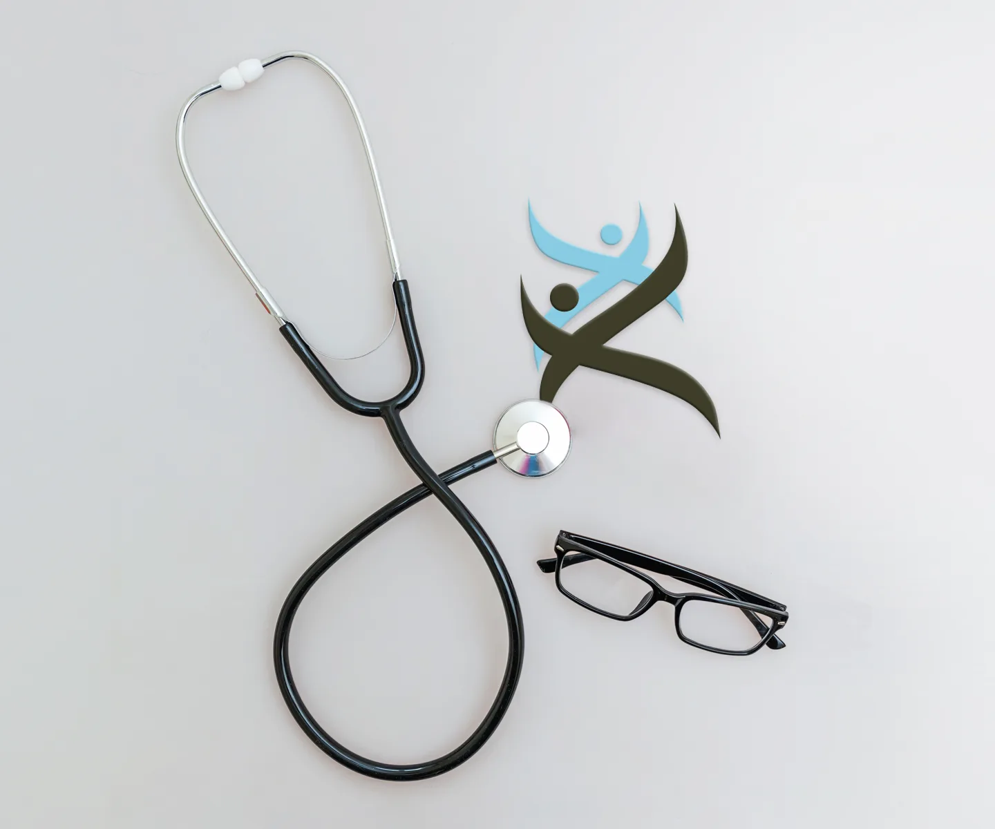 Stethoscope and glasses beside Preventous logo