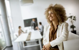 Professional woman in workplace, representing corporate health and wellbeing